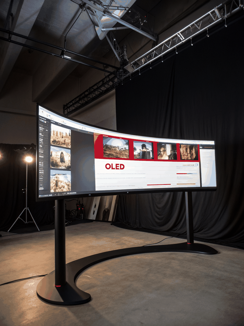 A premium, dark-themed streaming interface on a high-end display